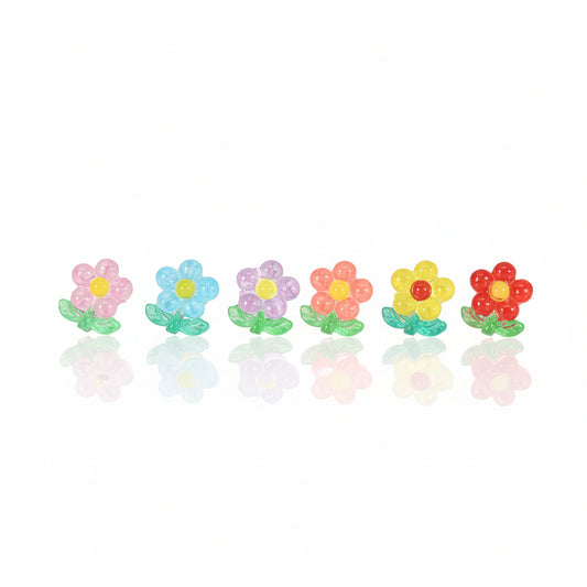 A set of colorful flower stem stud earrings displayed in a row, with colors including pink, blue, green, and yellow.