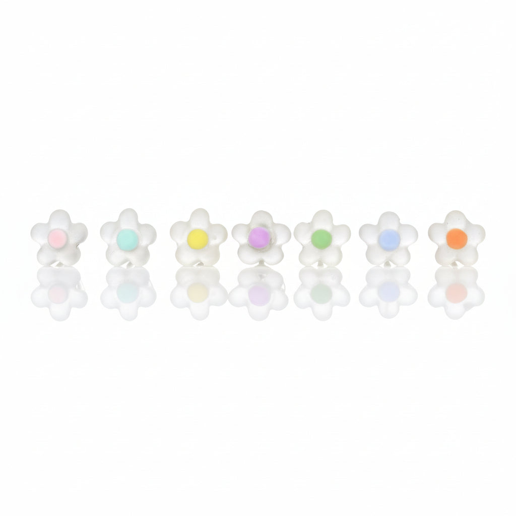 A collection of dainty dot flower stud earrings in various colors, set against a neutral background.