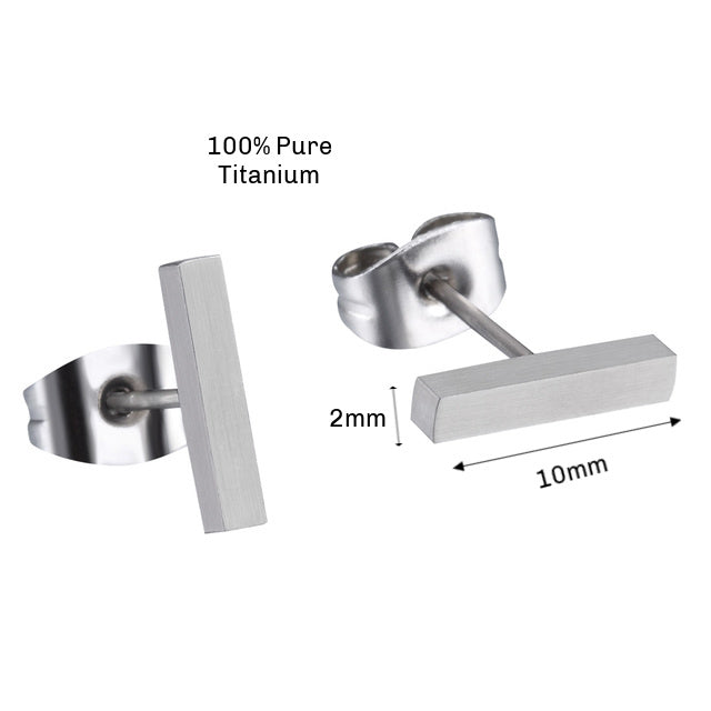 A pair of silver titanium bar stud earrings with butterfly back closures.