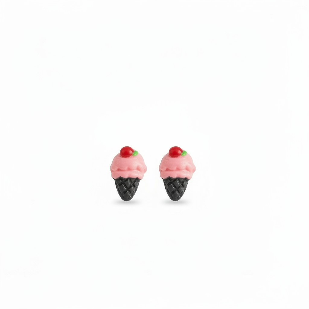 A pair of pink ice cream cone stud earrings held between fingers, with the cone design and a single pink scoop on top.