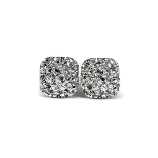 A pair of silver square druzy stud earrings with rounded corners on a white background, with a text overlay saying 'More Colors'.