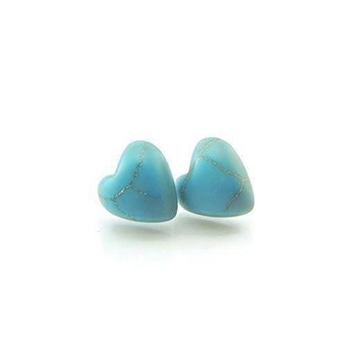 A pair of heart-shaped simulated turquoise stone stud earrings against a white background.