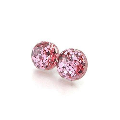 A pair of pink glitter filled resin earrings with round cabochons.